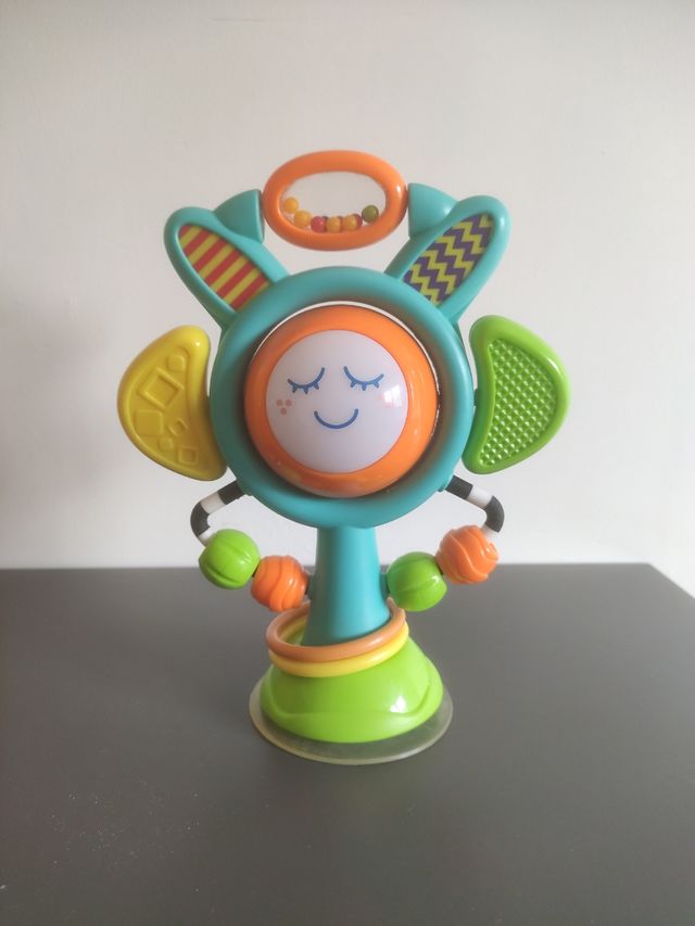 Flor musical sonajero con luces