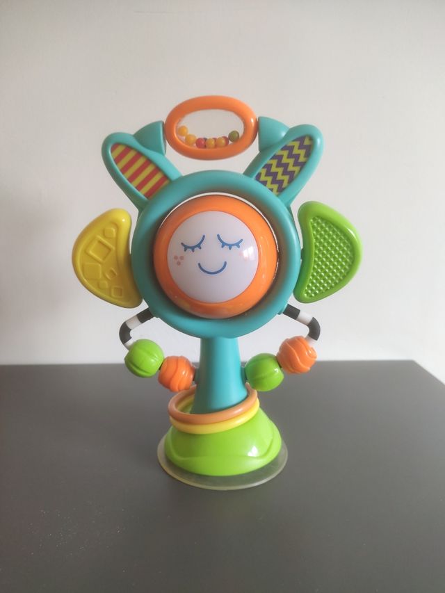 Flor musical sonajero con luces