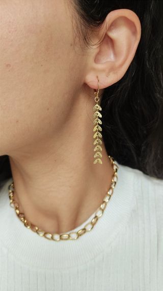 Conjunto pendientes largos y pulsera espiga