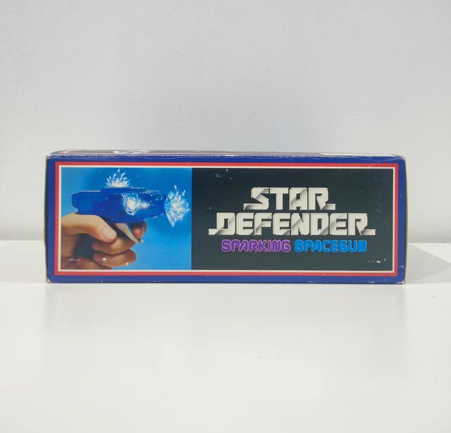 Star Defender Expositor Pistolas Años 80 Nuevo