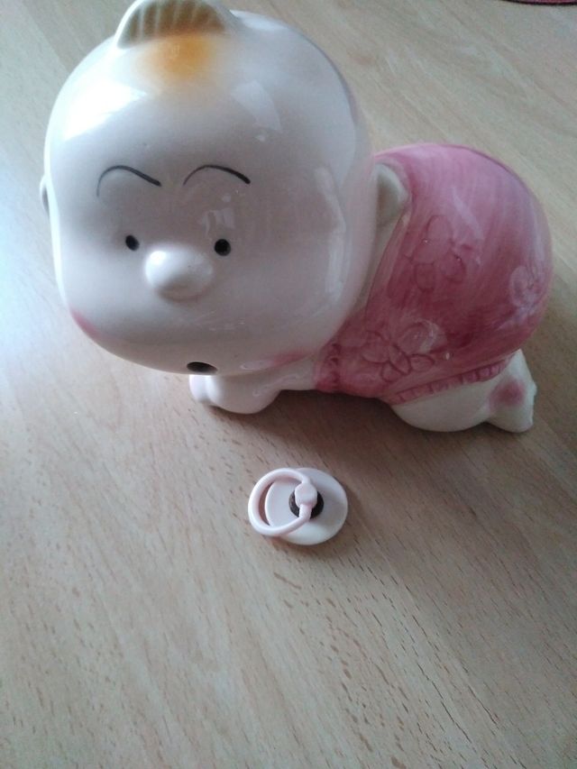 Dos huchas de porcelana ( niña y niño) vintage