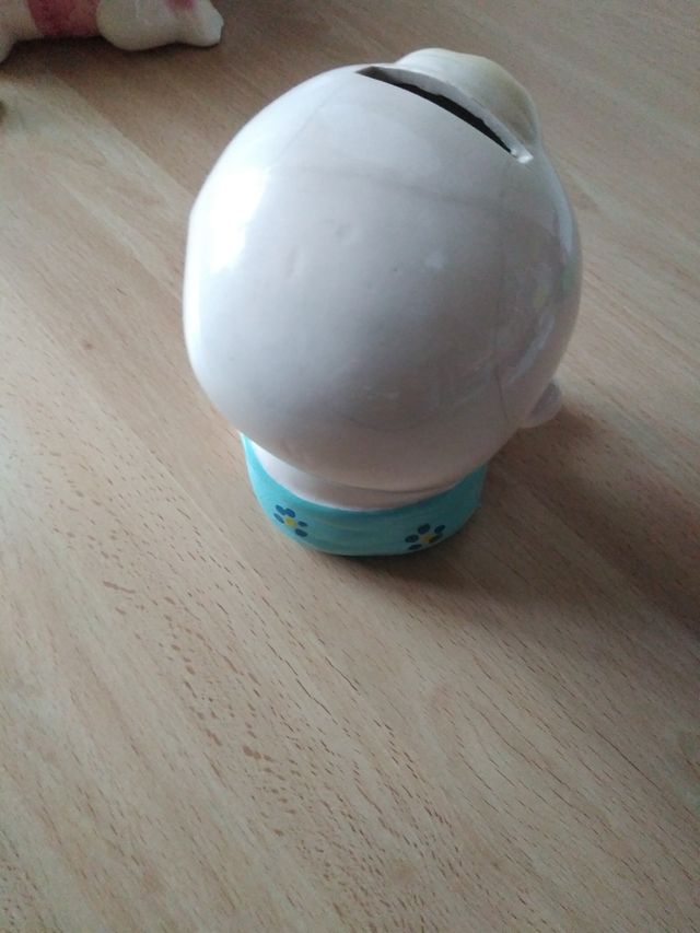 Dos huchas de porcelana ( niña y niño) vintage