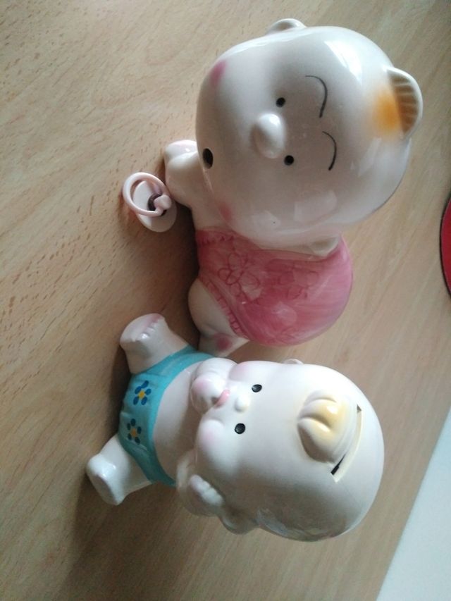 Dos huchas de porcelana ( niña y niño) vintage