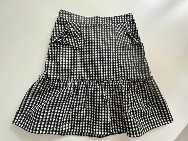 LOTE falda cuadros de ADOLFO DOMÍNGUEZ y top.