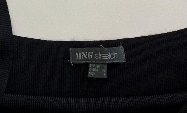 LOTE falda cuadros de ADOLFO DOMÍNGUEZ y top.