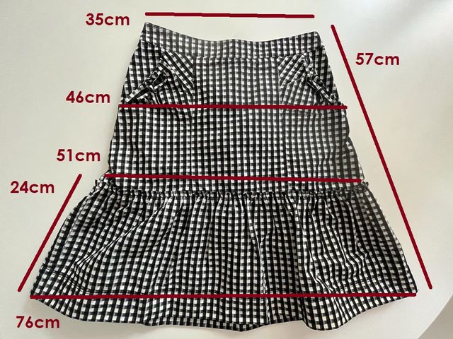 LOTE falda cuadros de ADOLFO DOMÍNGUEZ y top.