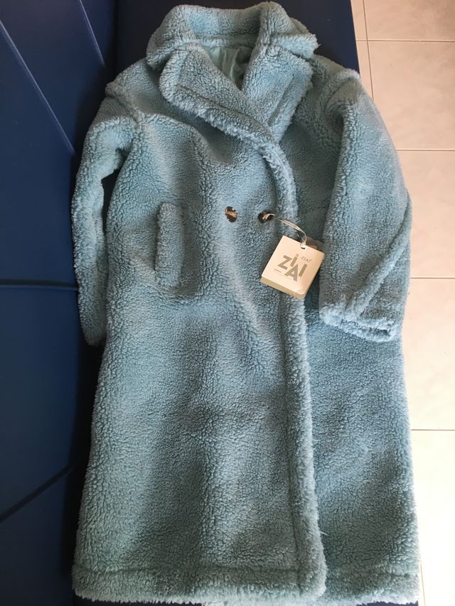 Cappotto teddy celeste .Veste anche una M