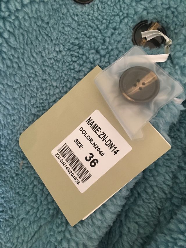 Cappotto teddy celeste .Veste anche una M