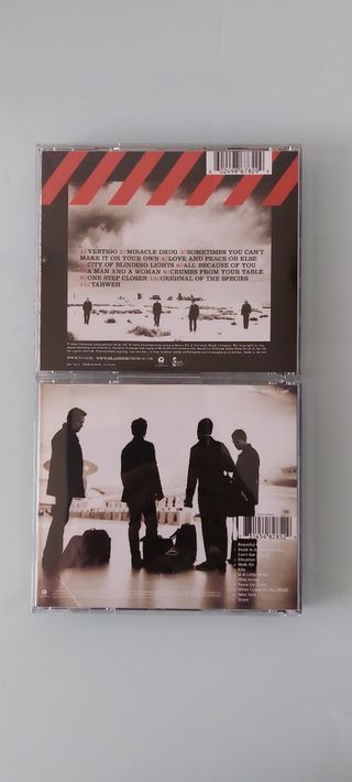 Lote de 2 CDs de U2 .