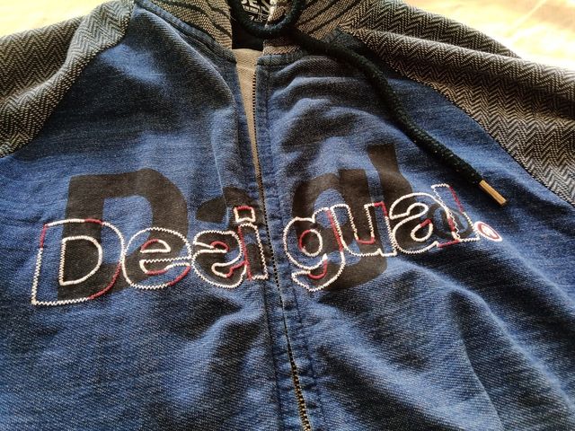 chaquetita sudadera desigual talla M