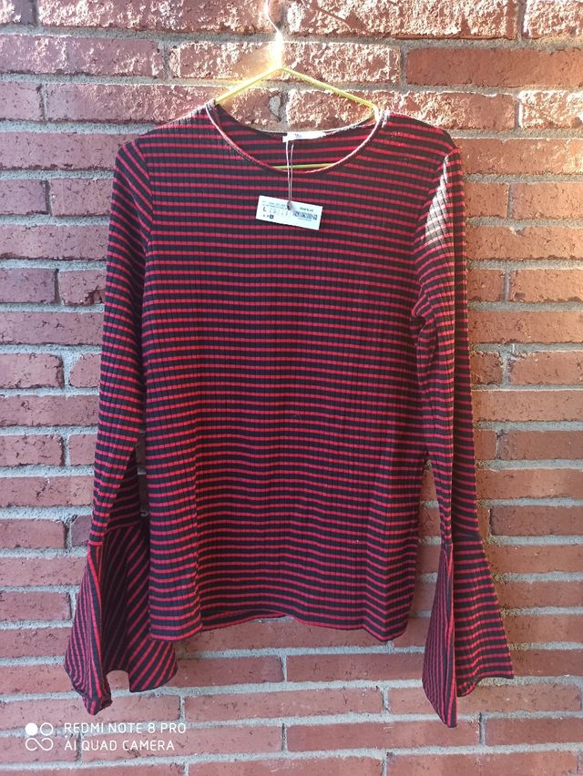 Jersey punto com manga acampanada