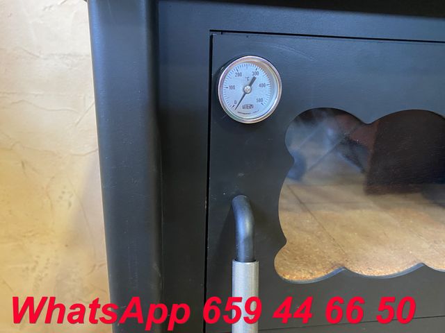 Estufa de leña con horno independiente