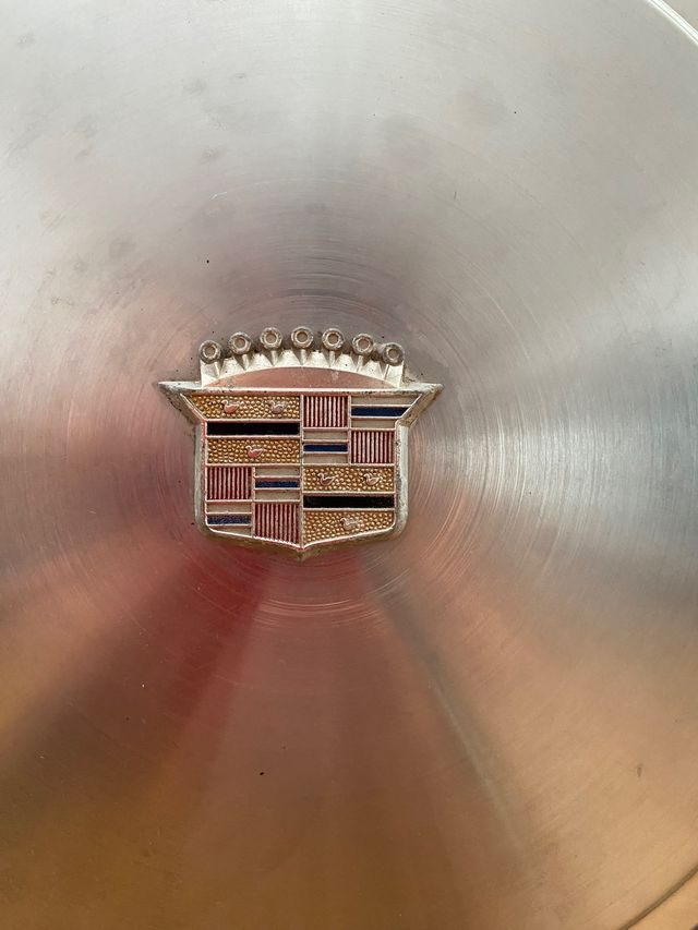 COPRICERCHI CADILLAC 63