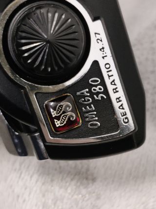 carrete Omega 580 con caja.