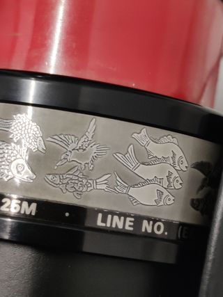carrete Omega 580 con caja.