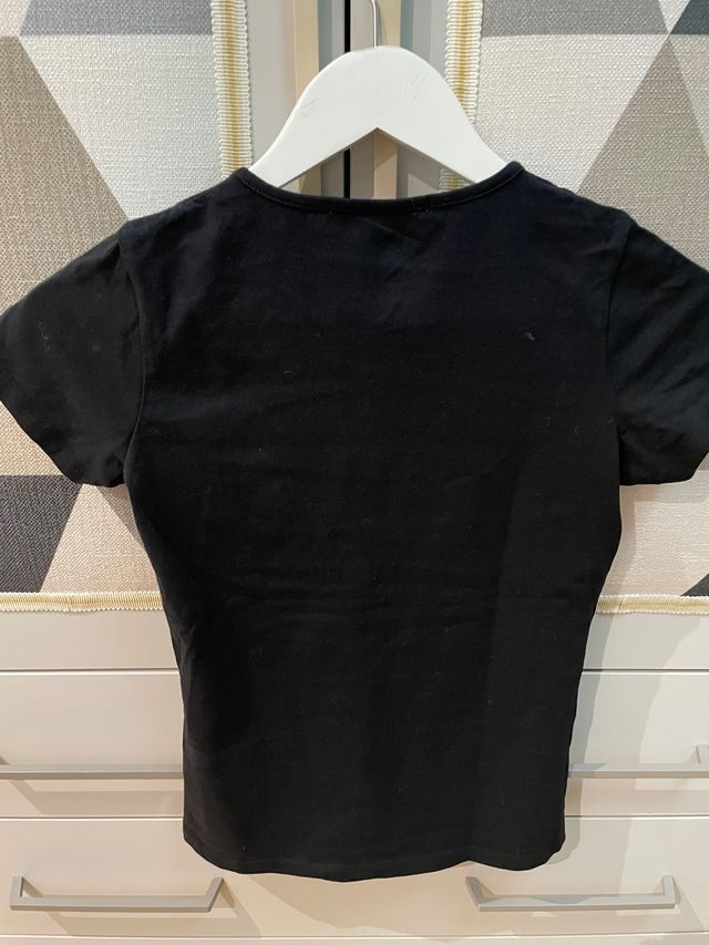 Camiseta Negra de Imperio Clandestino