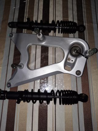AMONTIGUADORES TRASEROS SYM JET 14 - 125CC