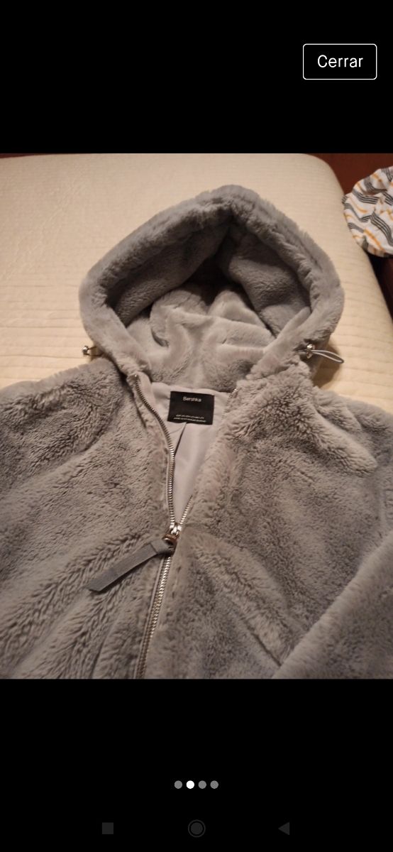 cazadora de pelo gris