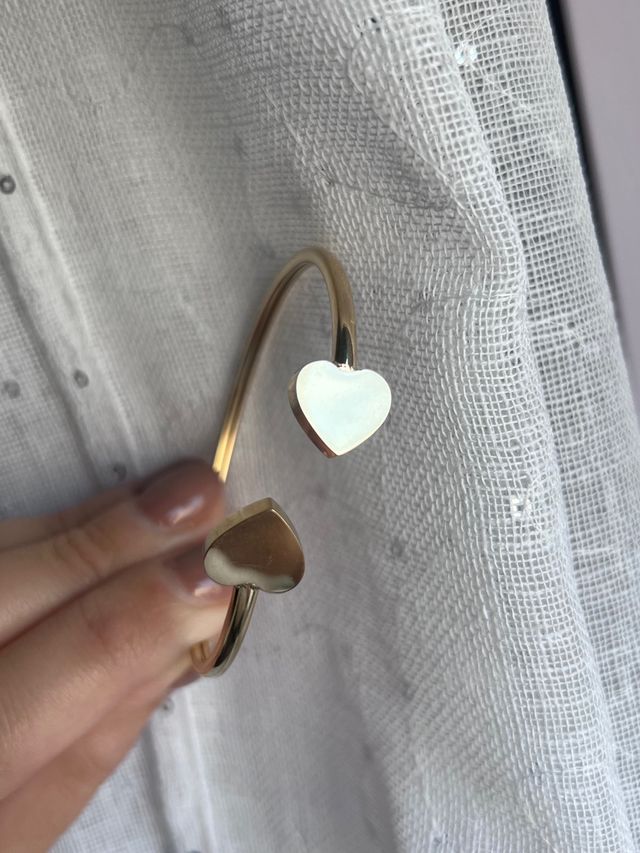 Bracciale rigido cuori dorati acciaio