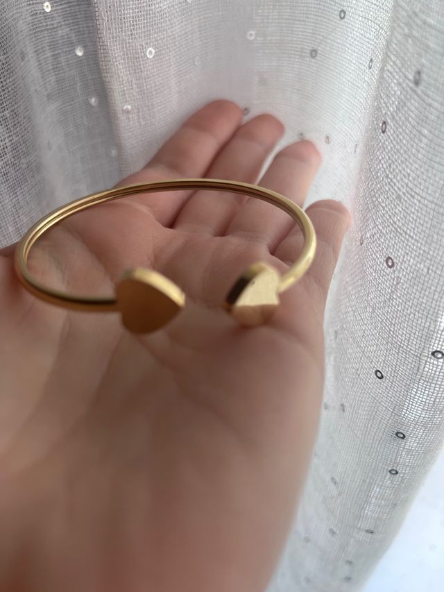 Bracciale rigido cuori dorati acciaio