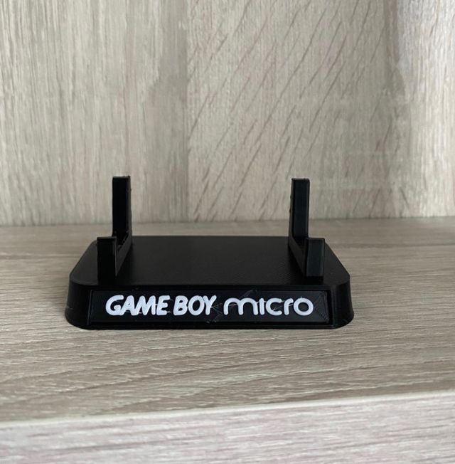 Soporte expositor game boy micro .