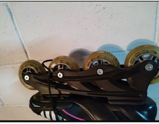 patines en linea negros y morados 