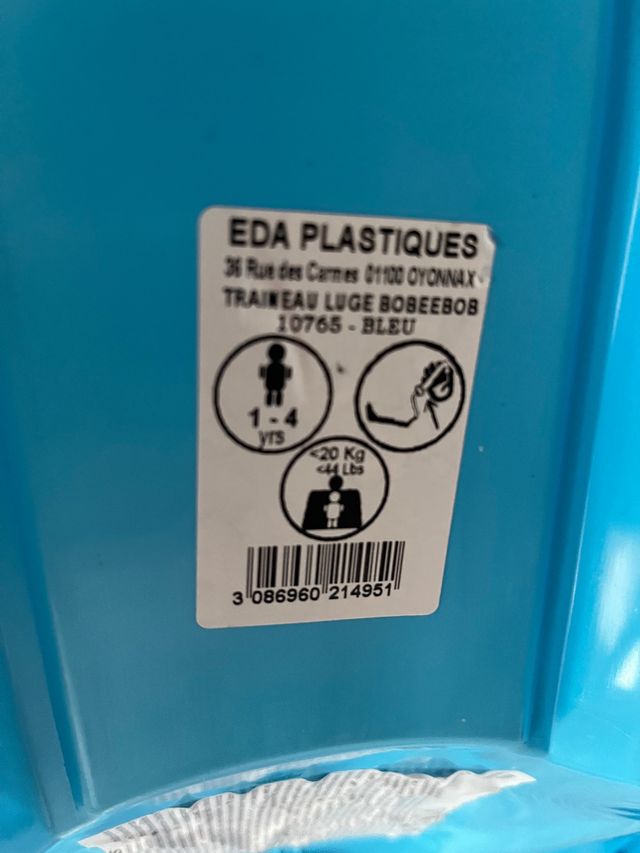 Trineo con cinturón de seguridad.