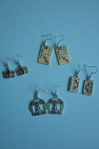 Pendientes de cámara fotográfica