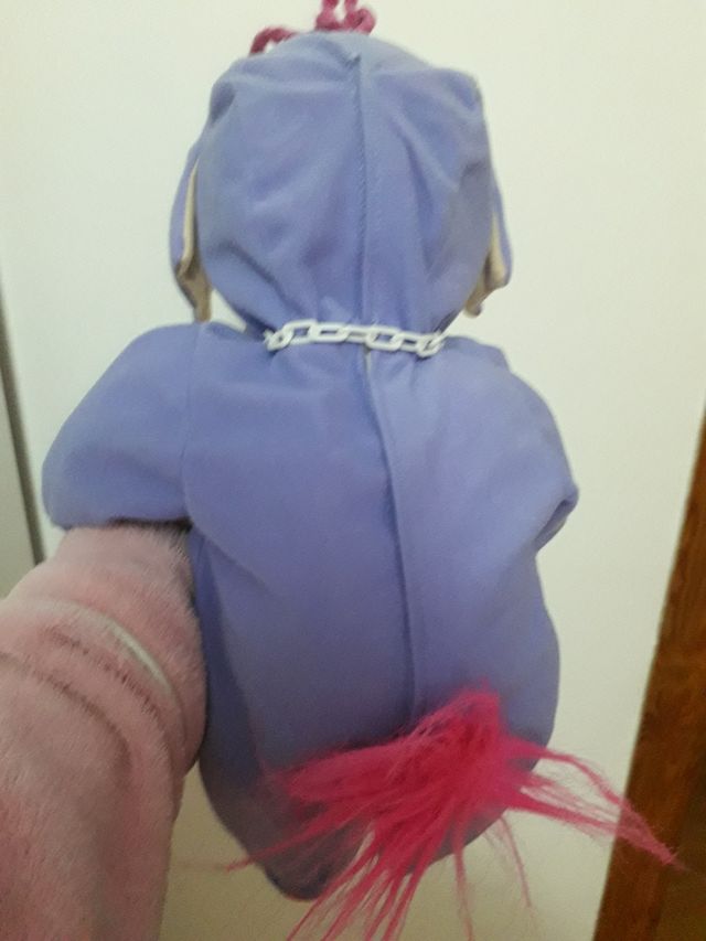 muñeco bebé con traje de elefante