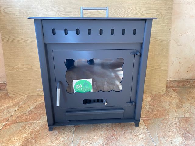 Estufa de leña con horno en tapadera