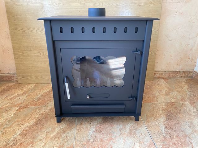 ESTUFA DE LEÑA SALIDA 12 CMS ARRIBA