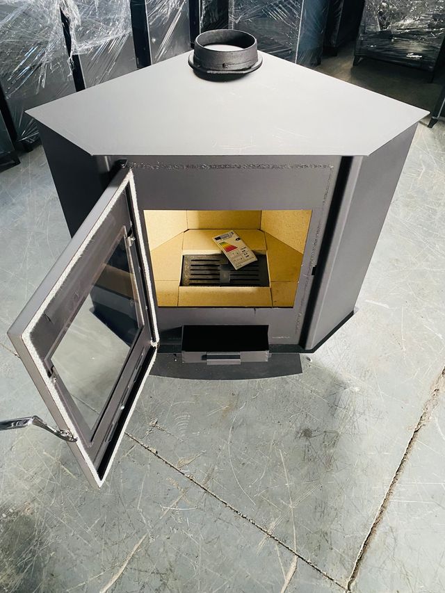 Estufa de leña de rincon recubierta