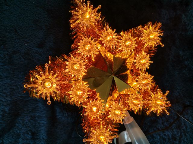 Estrella punta de árbol de Navidad