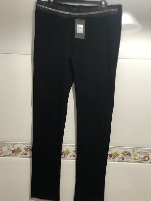 malla con adorno en imitación cuero y strass