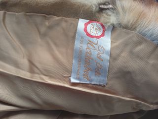 dos abrigos cortos de zorros talla como L 