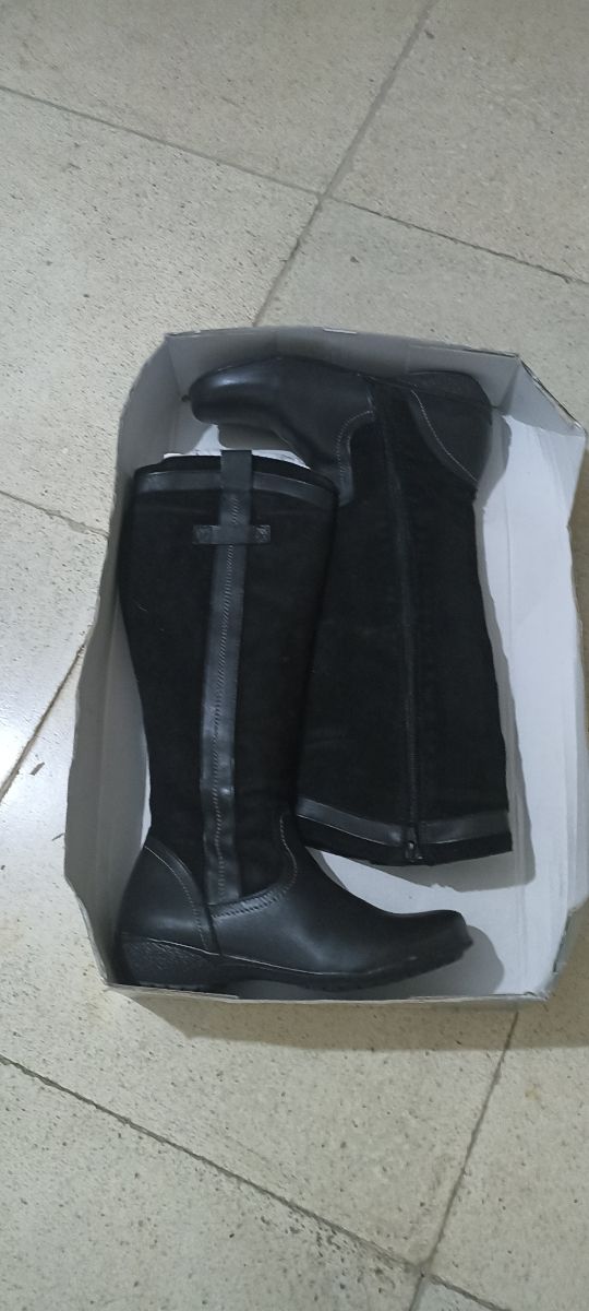 Botas de piel y piel vuelta