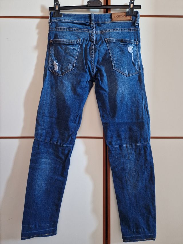 Jeans skinny strappati patchwork