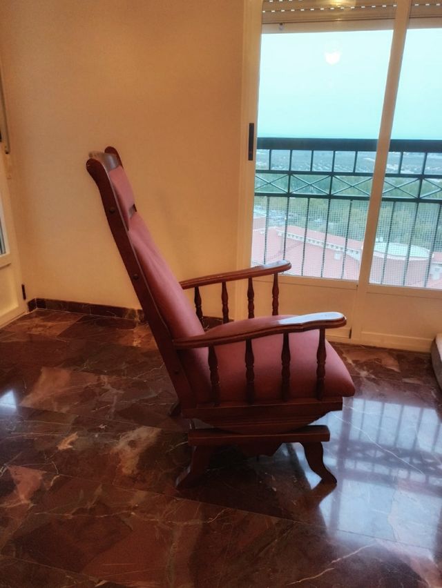 sofá mecedora como nuevo