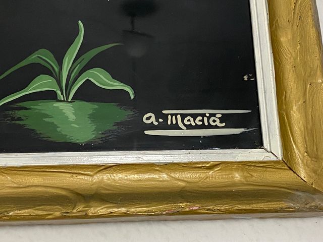 Una pintura de un río pintada sobre vidrio