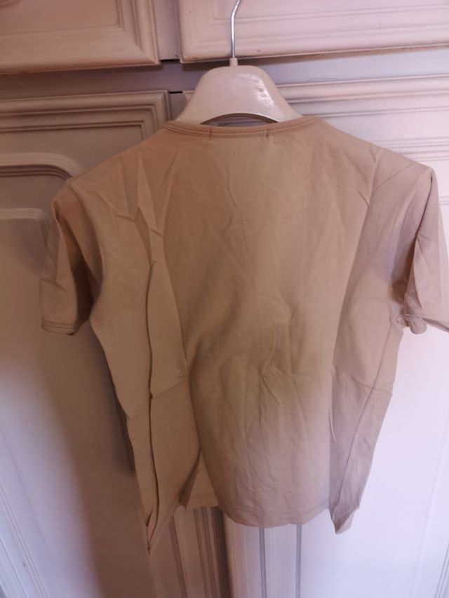 t-shirt beige pennellate di glitter bronzo