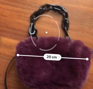 Mini bolso de pelo granate de Parfois 
