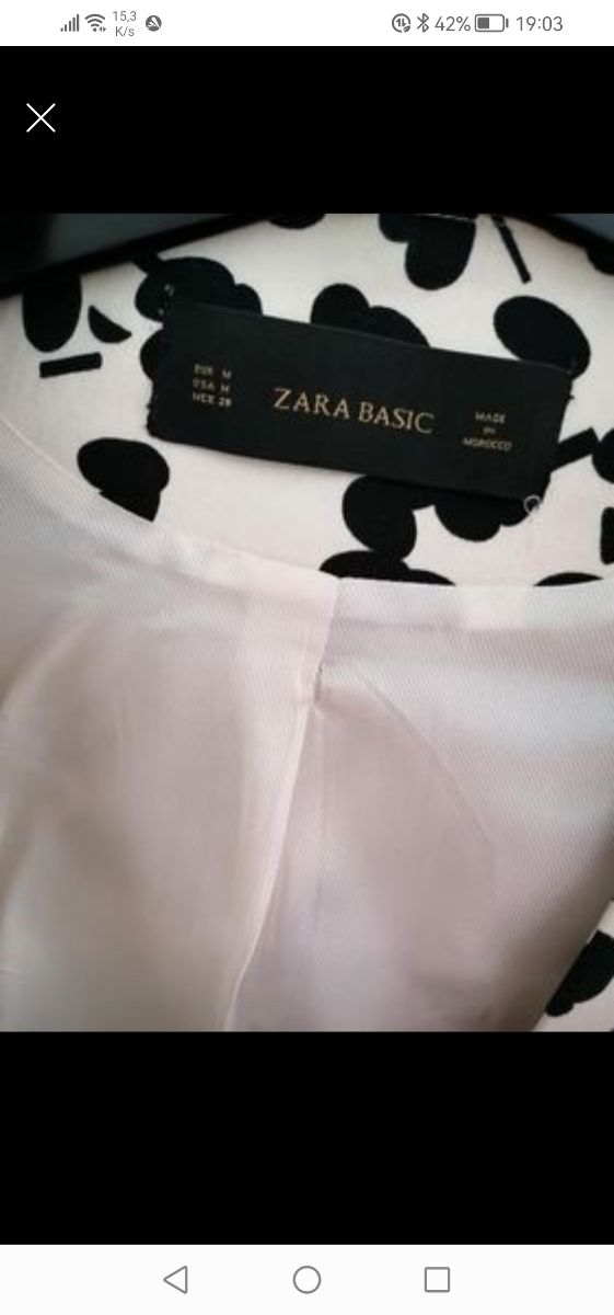 casaco curto. preto e branco 