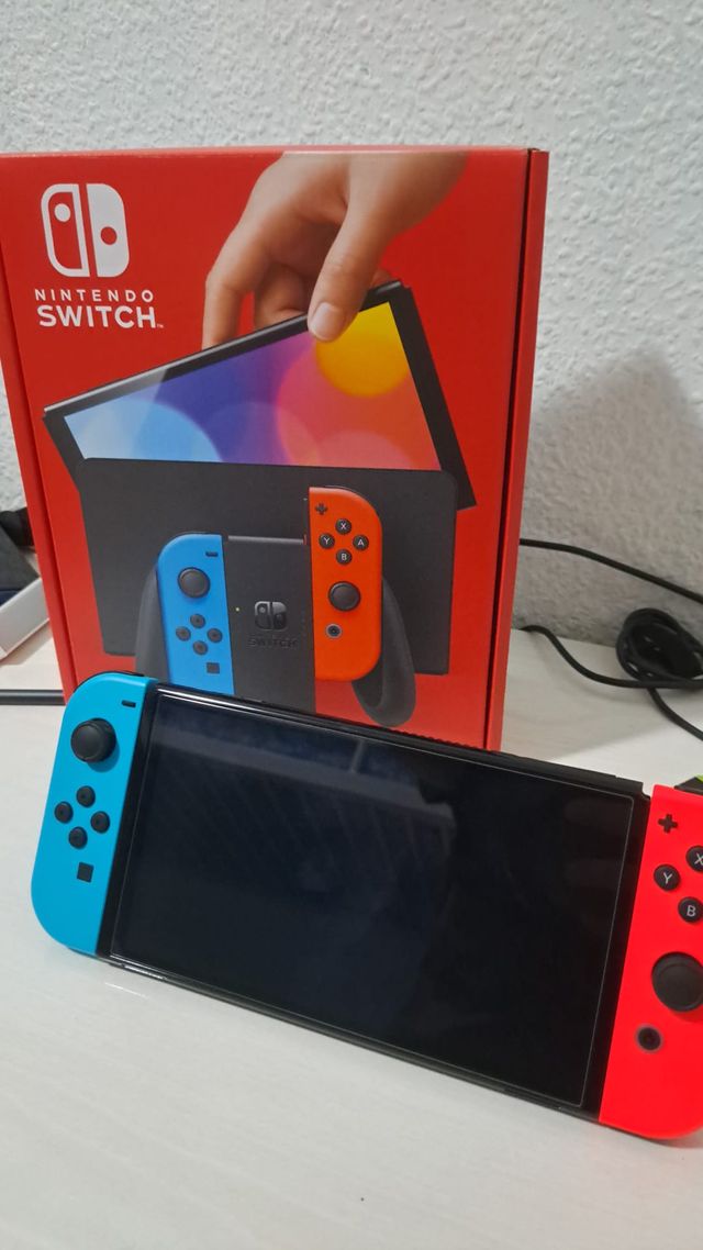 Nintendo Switch Oled Azul Neón Rojo De Segunda Mano Por 280 Eur En