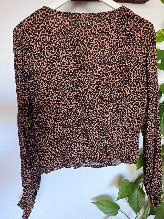 Blusa estampado animal.