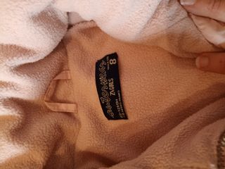 abrigo de niña tipo plumas de Zara talla 8