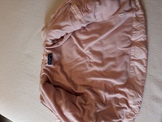 abrigo de niña tipo plumas de Zara talla 8