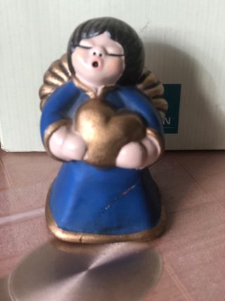 Angelo thun blu da riparare con cuore