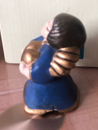 Angelo thun blu da riparare con cuore