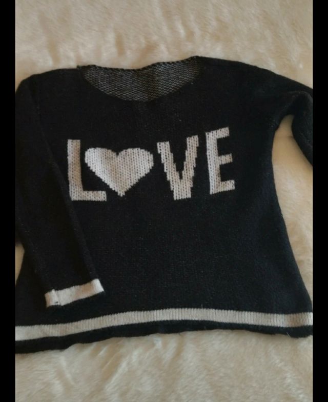 Jersey negro y corazón 