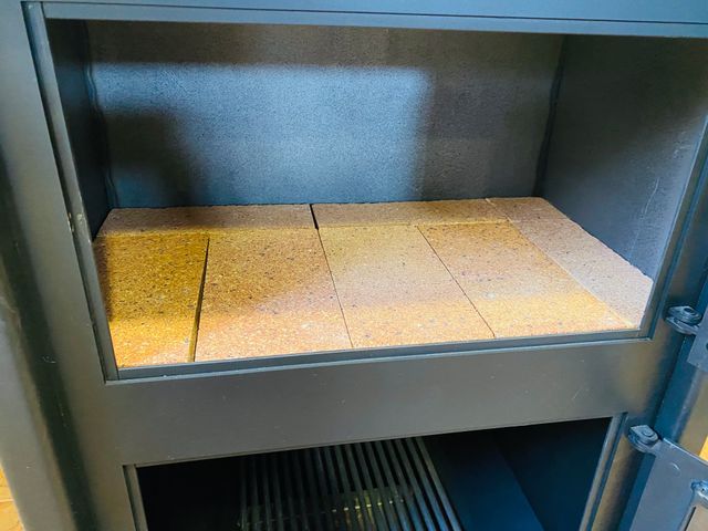 Estufa de leña con horno independiente